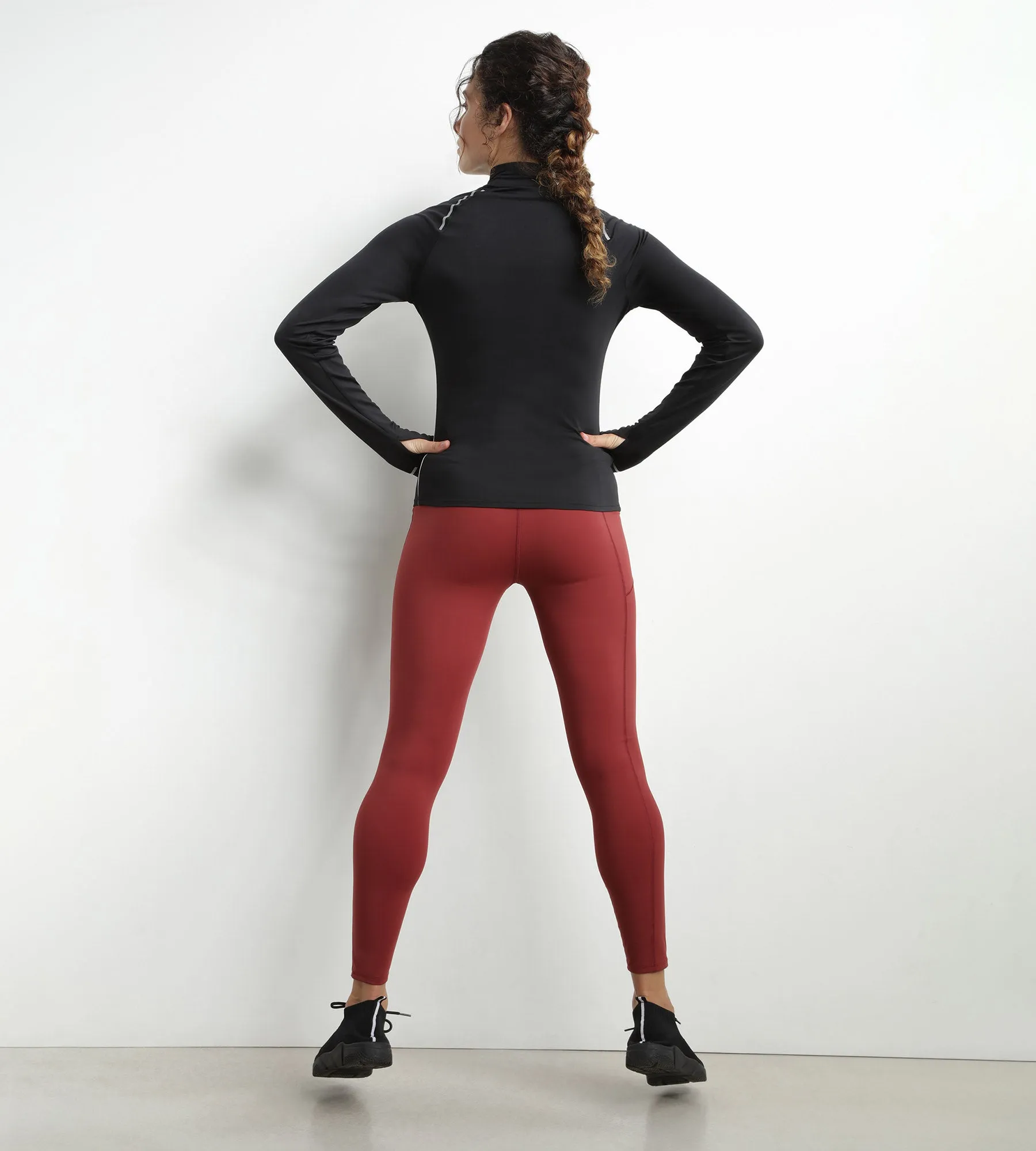Haut de sport femme à col montant en microfibre noire Dim Move